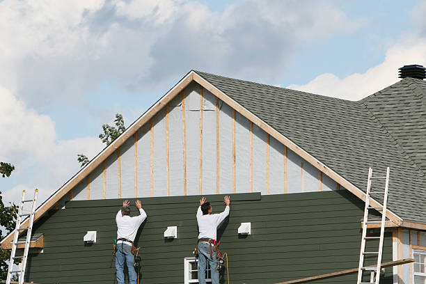 Professional Siding Contractor technician working in Adena, OH